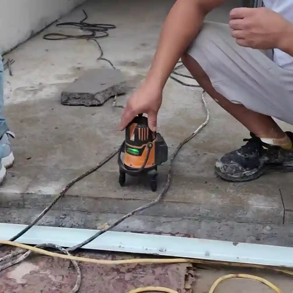 Using a laser level and reference line to establish the installation height
