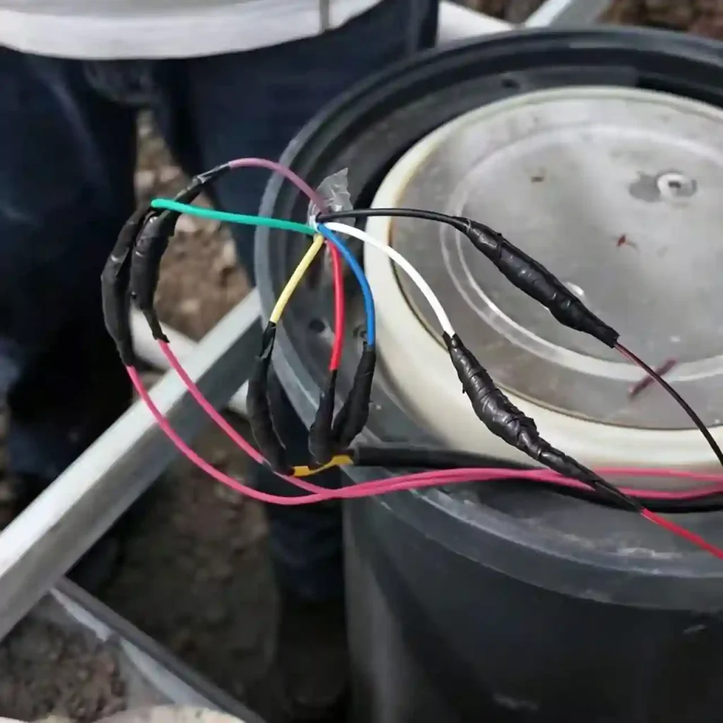 Waterproofing and insulating electrical connections inside an automatic bollard